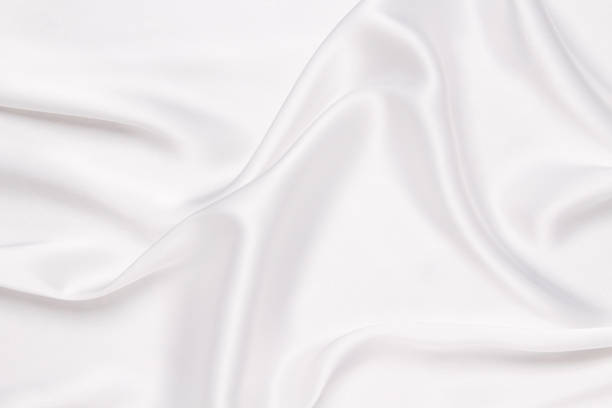 istock Elegance white satin silk with waves, abstract background luxury cloth, elegant wallpaper design. Abstract background luxury cloth or liquid wave 1560548734