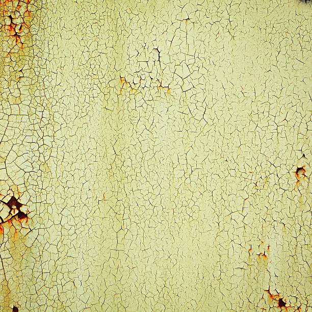 Close-up detail of cracked paint on wall.