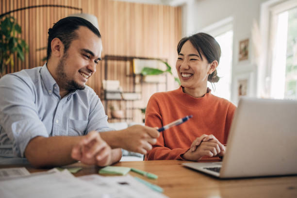 istock Man and woman working in home office 1560556792