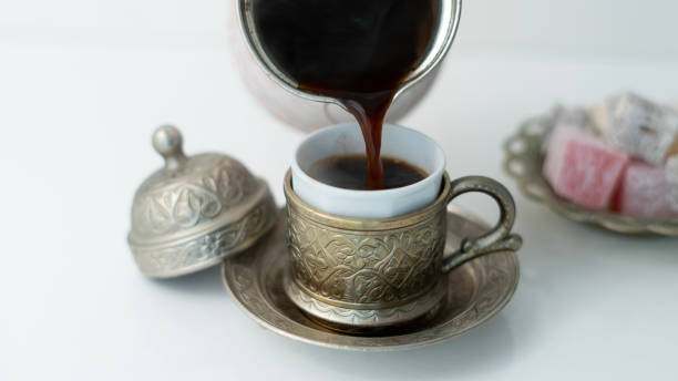 istock coffee pouring in glass 1560561618