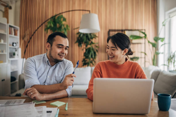 istock Man and woman working in home office 1560561645