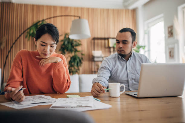 istock Man and woman working in home office 1560570855