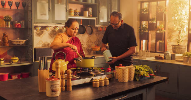 Vibrant Indian Elderly Cooking Local Cusisine Together: Exploring Flavors, Trying Traditional Cultural Recipes, and Creating Culinary Delights. Relationship with Shared Passion for Food.