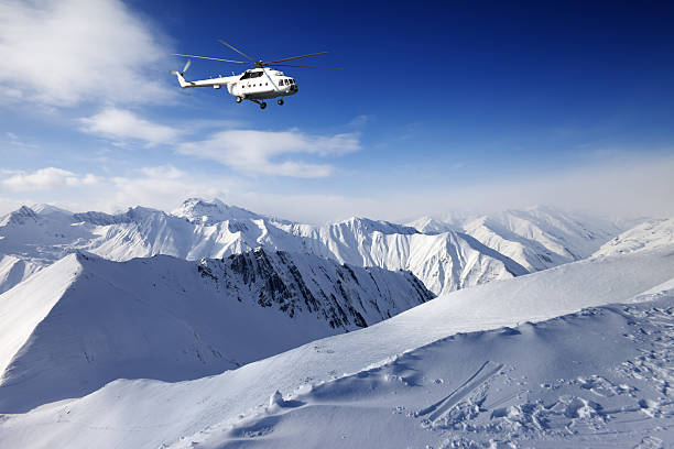istock Heliski in snowy mountains 156060820