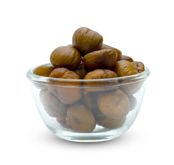 istock peeled roasted chestnut in glass bowl isolated on white background ,include clipping path 1560616409