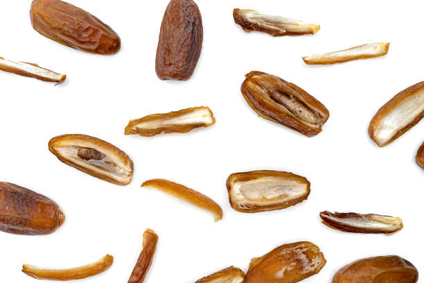dry dates palm sliced isolated on white background.
