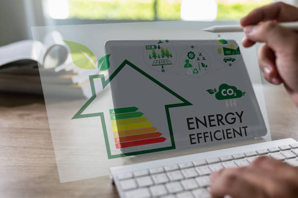 istock Energy efficiency mobile app on screen man saving energy diagram cost economy calculator money industry on computer concept ecology sustainable 1560652617