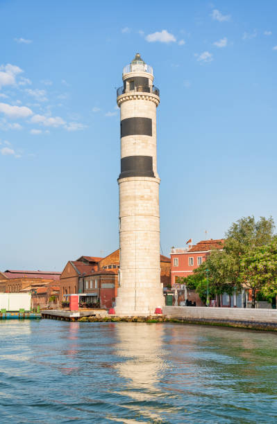 istock Murano Lighthouse (Faro di Murano) located on Murano island in Venice 1560655535