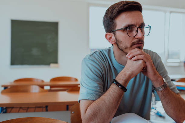 istock The student carefully follows the lessons in a modern classroom 1560678111