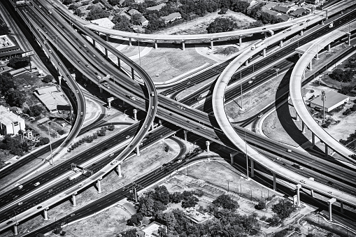 Aerial view of an Austin freeway ramp and intersection located just outside of downtown Austin, Texas shot from an altitude of about 1000 feet.