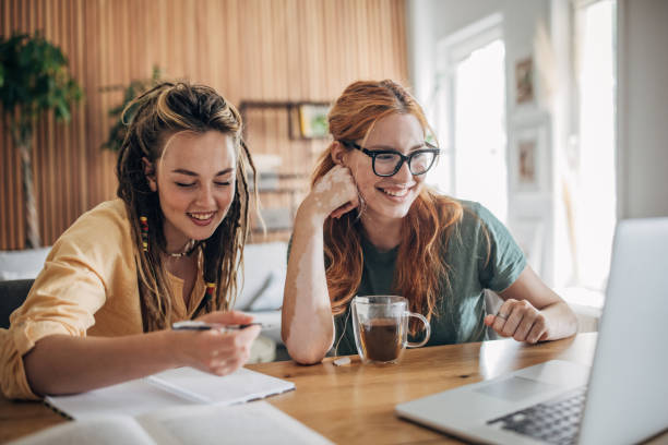istock Young women studying at home 1560713550