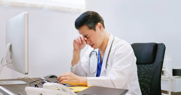 istock asian senior doctor is depressed 1560728379