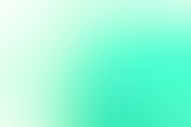 istock Blurred abstract green cyan gradient mint color transit colourful frosted glass effect aura  background 1560743959