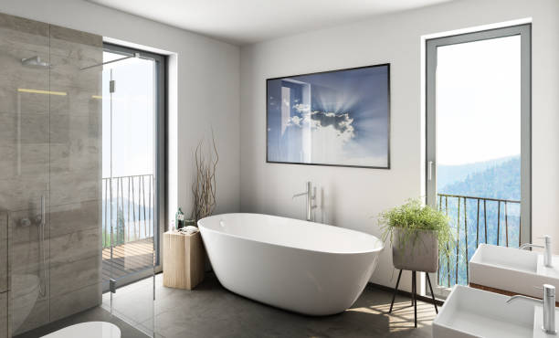 Modern bathroom with a freestanding bathtub and  gray tiles 3d rendering of a modern bathroom with a freestanding bathtub and  gray tiles free standing bath stock pictures, royalty-free photos & images