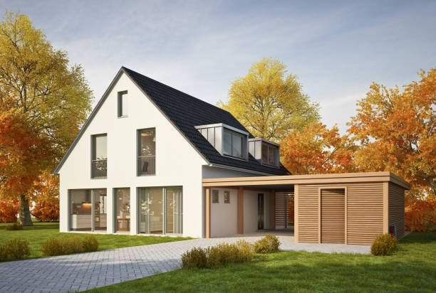 istock Modern house with garage in autumn 1560744941