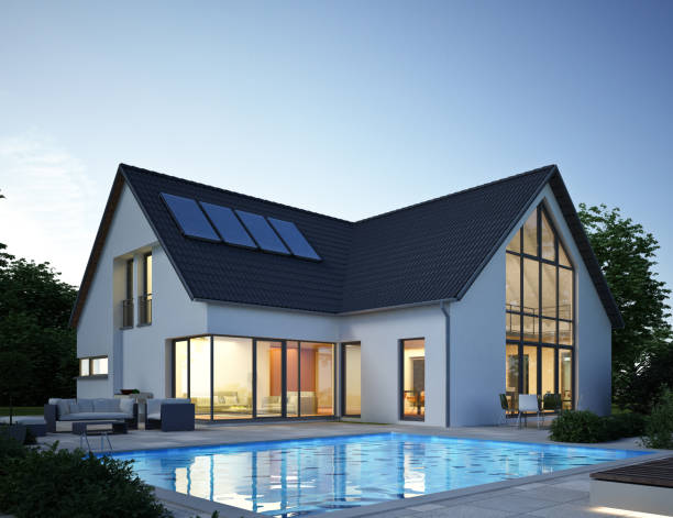 istock Modern white house with pool in the evening 1560745212