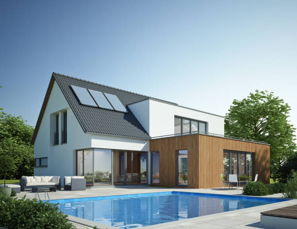 istock Modern white house with wooden extension and pool 1560745217