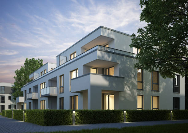 istock Modern apartment house in the evening 1560745231