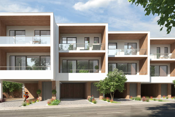 istock Modern town houses with wooden wall elements 1560745251