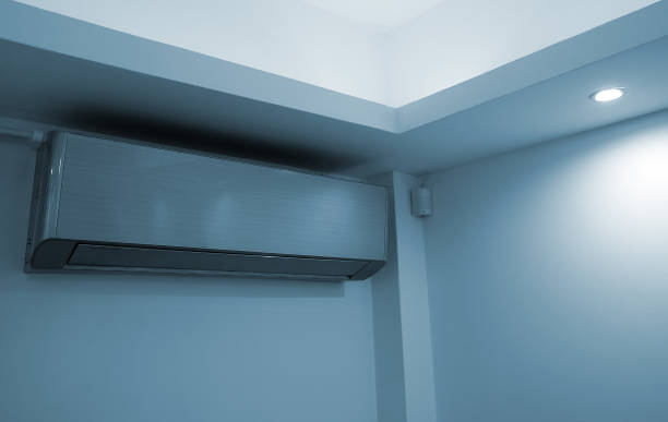 istock Air conditioner inverter mounted on the wall. 1560745711
