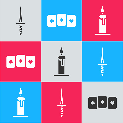 Set Dagger, Playing cards and Burning candle in candlestick icon. Vector.