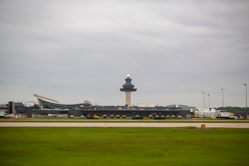 Main terminal and air traffic control tower at Washington Dulles International Airport in May 2022