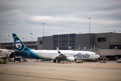 Alaska Airlines Boeing 737-900ER aircraft with registration N274AK parked at gate at Washington Dulles International Airport in May 2022