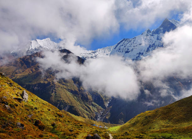 Annapurna base camp, Nepal, Machhapuchhare or fishtail mountain. Machapuchare, Machhapuchchhre or Machhapuchhre, is a mountain situated in the Annapurna massif of Nepal.