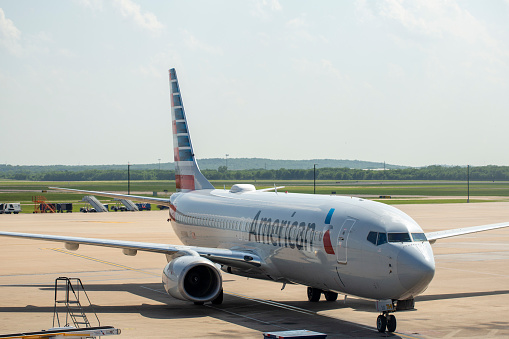 American Airlines Boeing 737-823 aircraft with registration N909NN arriving at a gate at Austin-Bergstrom International Airport in May 2022