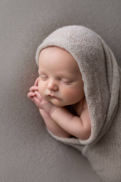 istock Newborn baby boy sleeping 1560871819