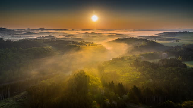 Foggy sunrise landscape - Aerial Shot