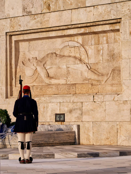 Athens - May 9, 2018: Changing of honor guard on Syntagma square in Athens, Greece. Presidential guard in traditional uniform are marching in front of Tomb of Unknown Soldier in Athens city center.
