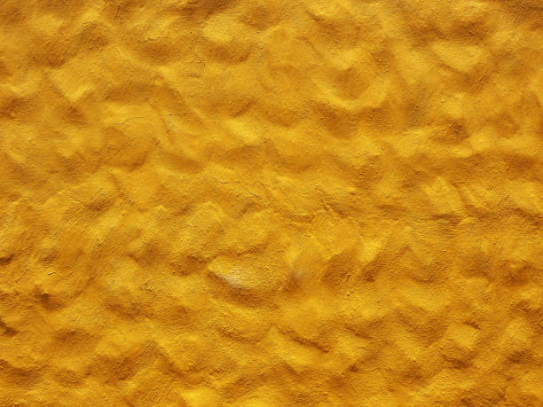 istock Yellow wall texture in Gran Canaria 1560919228