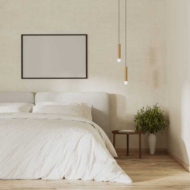 istock blank picture frame mock up above bed in modern bedroom interior, 3d render 1560938519