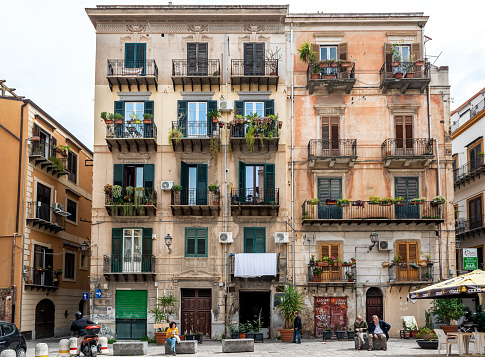 Palermo, Italy - May 18, 2023: Old street and residential buildings in Palermo, Sicily