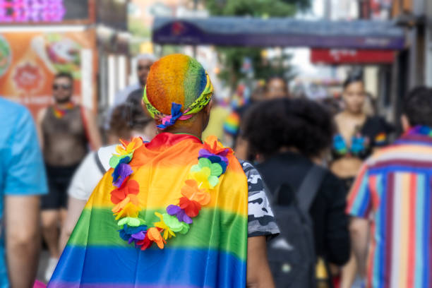 istock Person with rainbow head and flag. LGBT concept 1561015866
