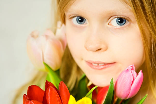 istock Girl and tulps 156103011