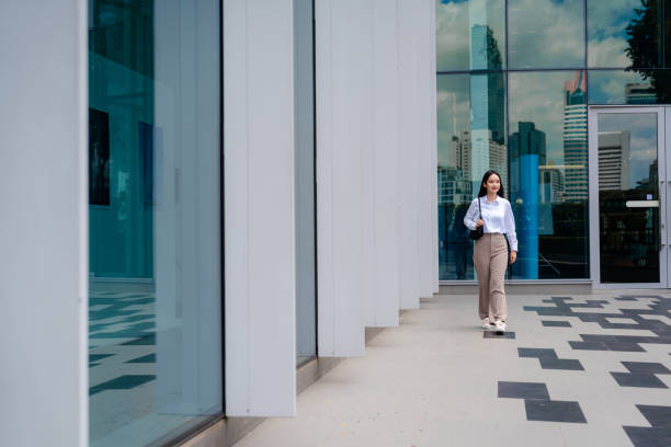 istock Public relations manager walking to work in the morning 1561030233