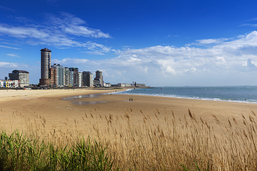 Vlissingen - a beautiful sandy bay with a coastal promenade of standing houses, hotels and restaurants.