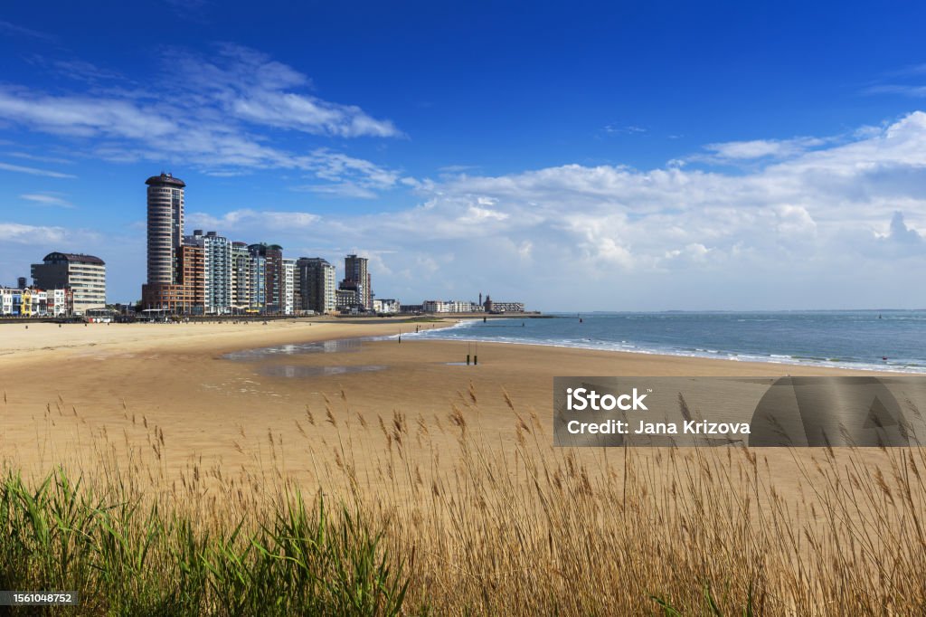 Vlissingen - a beautiful sandy bay with a coastal promenade of standing houses, hotels and restaurants. Architecture Stock Photo
