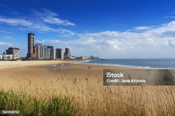 Vlissingen A Beautiful Sandy Bay With A Coastal Promenade Of Standing Houses Hotels And Restaurants Stock Photo - Download Image Now