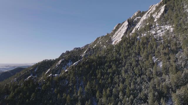 Aerial of snow on mountain peaks