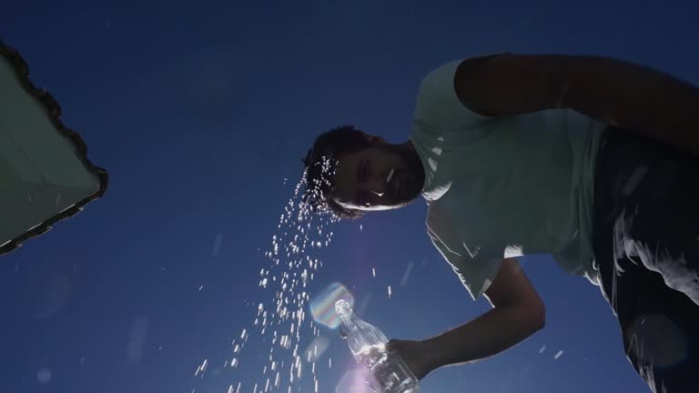 Man Cooling Down On Hot Summer