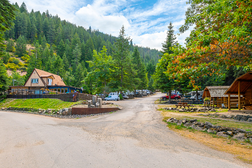 A rustic mountainside RV park and campground at Wolf Lodge Bay near the lake in Coeur d'Alene, Idaho, USA. Coeur d’Alene is a city in northwest Idaho. It’s known for water sports on Lake Coeur d’Alene, plus trails in the Canfield Mountain Natural Area and Coeur d’Alene National Forest. McEuen Park offers a grassy lawn and a trailhead for adjacent Tubbs Hill. The lakeside City Park & Beach includes picnic areas and a playground.