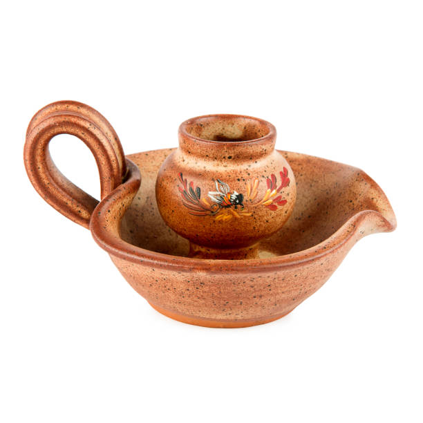 istock Candlestick made of clay isolated on a white background. 1561207812