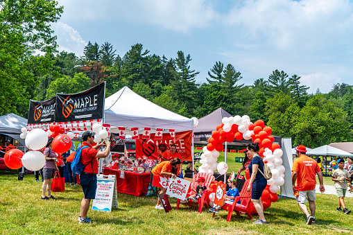 Woodbridge, Canada - July 1, 2023: People are celebrating Canada Day in Boyd Conservation Park, Woodbridge, Ontario, Canada.