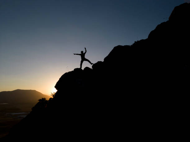 istock crazy mountaineer completing the route plans for his new route 1561266906