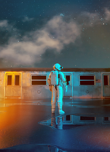 Man in space suit stands in front of a train with closed doors. He is ready to go on a mission or a journey. Could be a concept of the metaverse. It could also be about finding the right way to go forward and picking the right path.