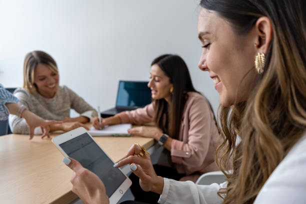 istock Business women working in the office 1561446478