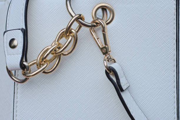 istock one yellow metal latch with a ring with chain on the strap 1561502446